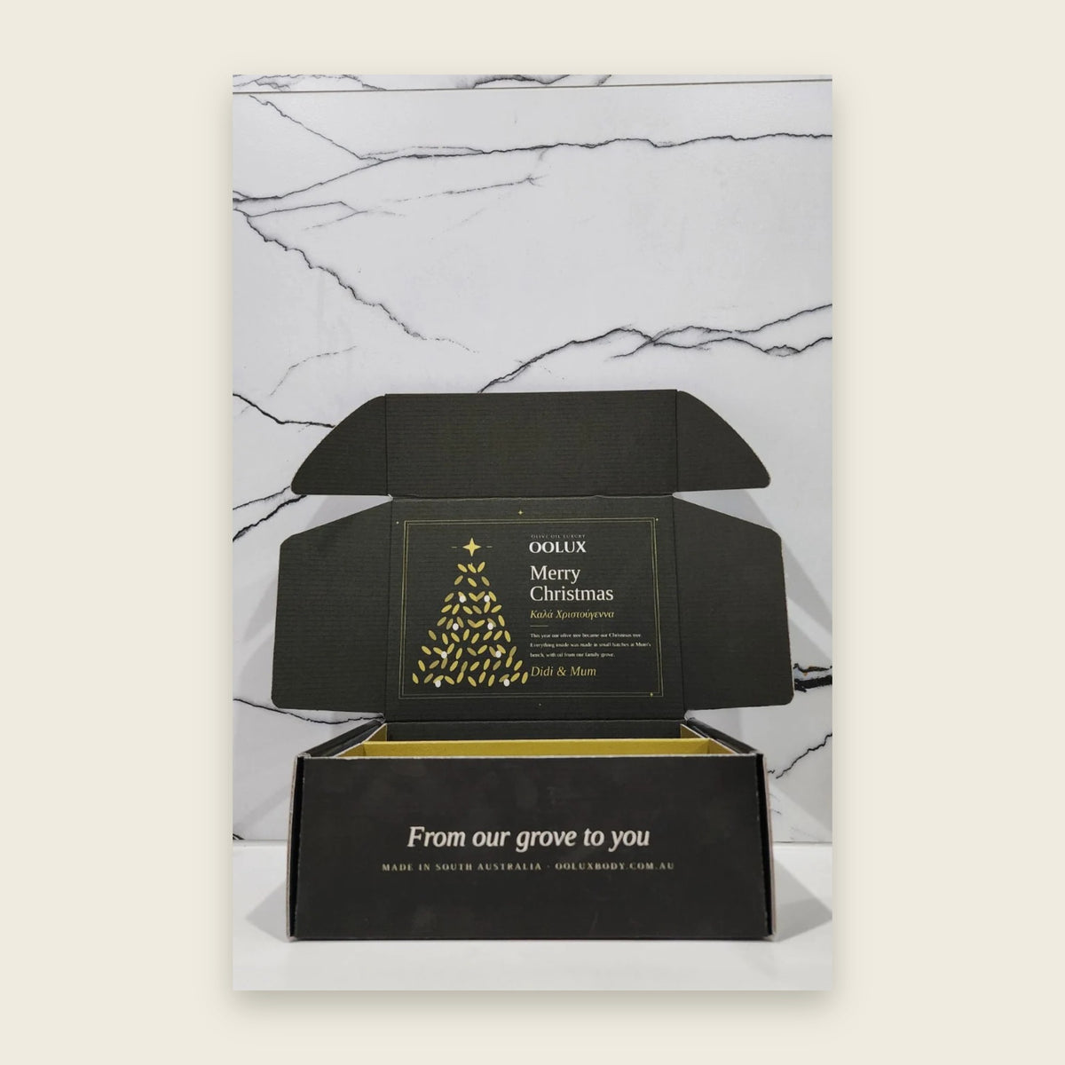 Inside the OOLUX Christmas gift box